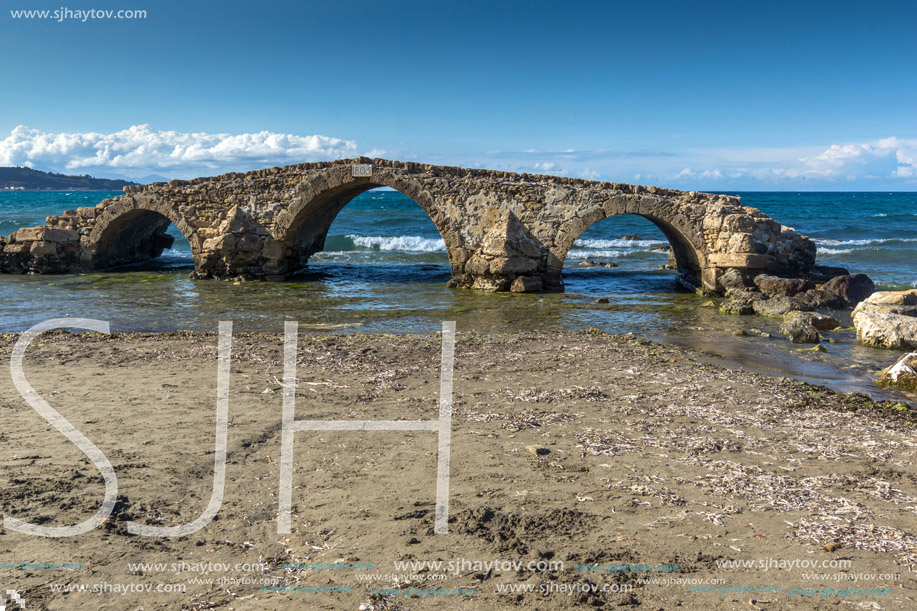medieval bridge in the water at Argassi beach, Zakynthos island, Greece