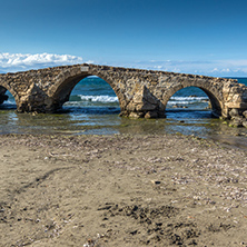 medieval bridge in the water at Argassi beach, Zakynthos island, Greece