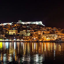 Amazing night photo of embankment and old town of Kavala, East Macedonia and Thrace, Greece