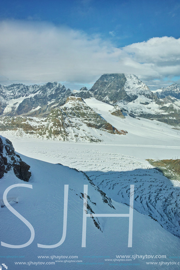 Amazing panorama of mount Matterhorn covered with clouds, Canton of Valais, Alps, Switzerland
