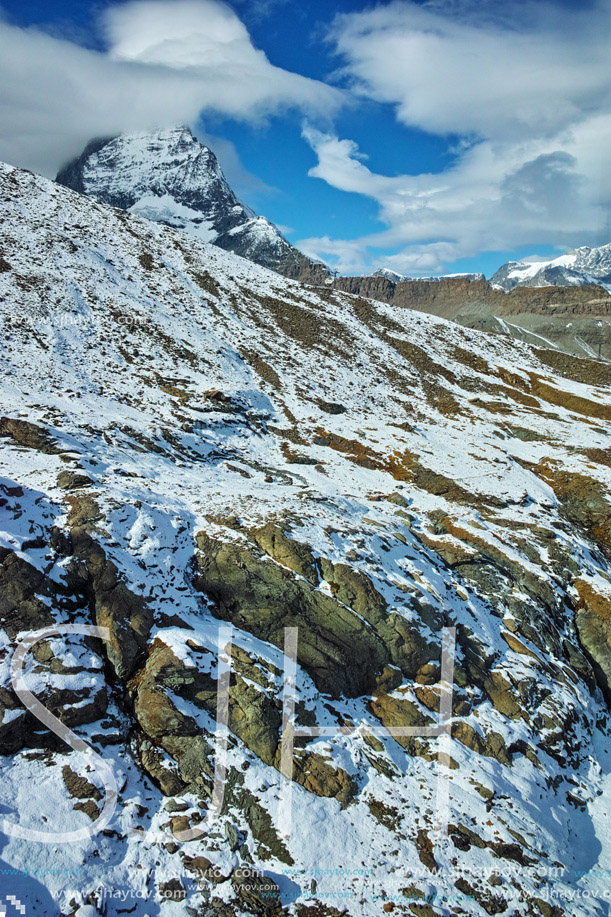 Amazing panorama of mount Matterhorn covered with clouds, Canton of Valais, Alps, Switzerland