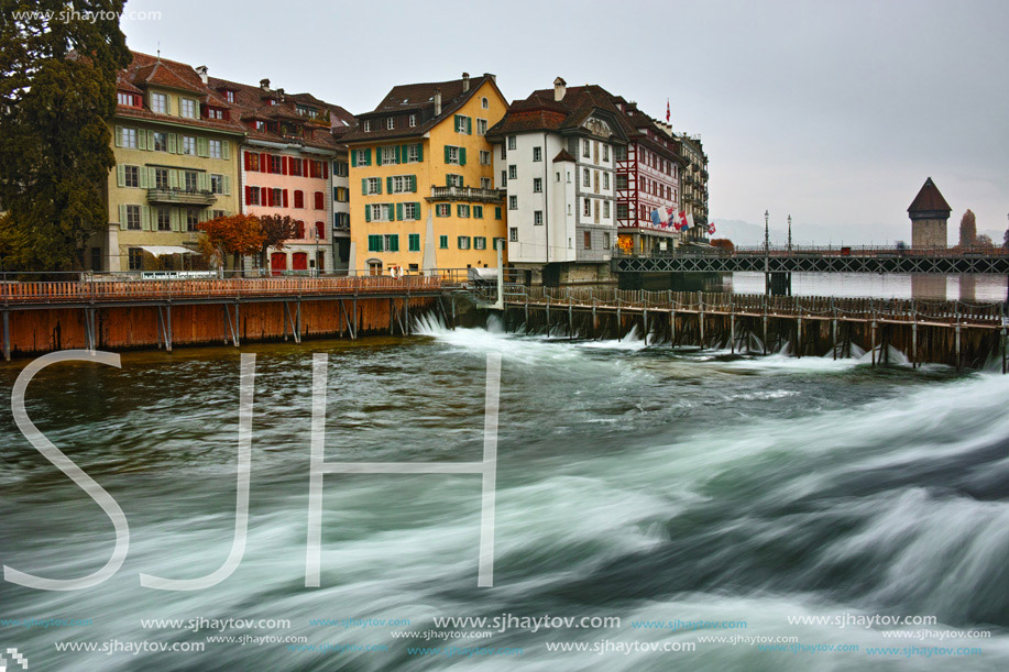 City of Luzern and reflection of old town in The Reuss River, Switzerland