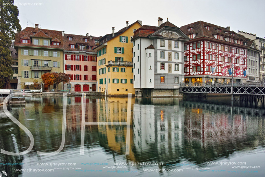 City of Luzern and reflection of old town in The Reuss River, Switzerland