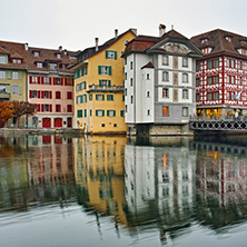City of Luzern and reflection of old town in The Reuss River, Switzerland