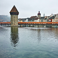Froggy morning over Chapel Bridge and Reuss River, Lucerne, Switzerland