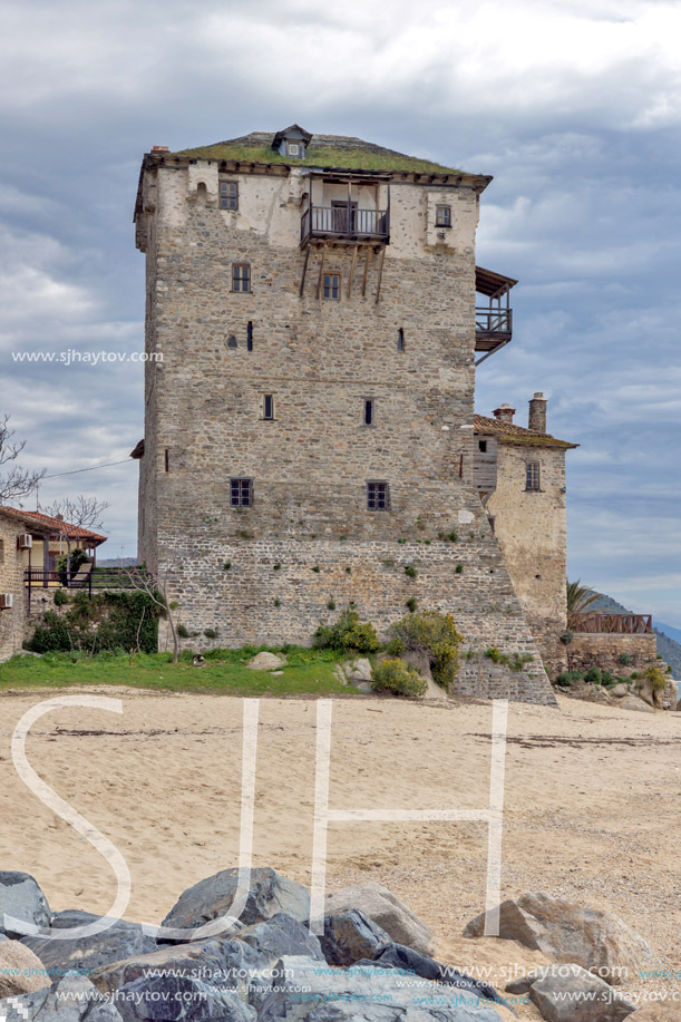 Amazing view of Beach and Medieval tower in  Ouranopoli, Athos, Chalkidiki, Central Macedonia, Greece