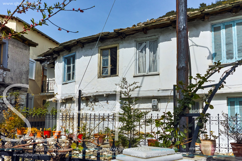 Spring flowers and Old house in village of Panagia, Thassos island,  East Macedonia and Thrace, Greece