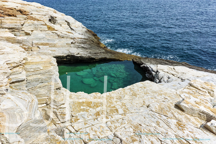 Green waters of Giola Natural Pool in Thassos island, East Macedonia and Thrace, Greece