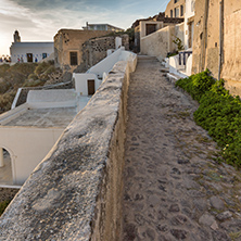 Sunset view of street in Fira, Santorini island, Thira, Cyclades, Greece