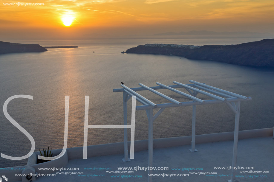 Amazing Sunset landscape in town of imerovigli, Santorini island, Thira, Cyclades, Greece