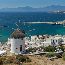 Amazing Seascape of white windmill and island of Mykonos, Cyclades, Greece
