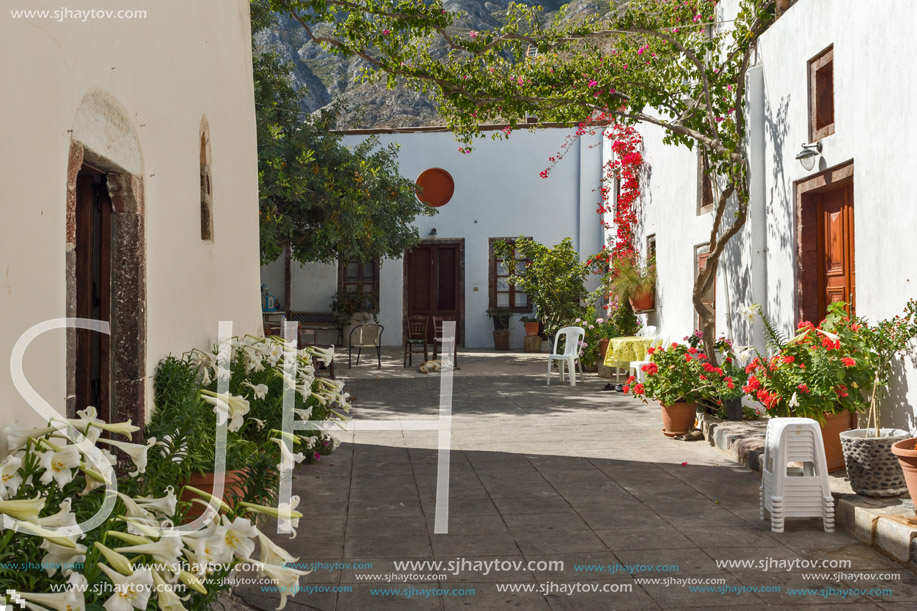 Flowers in Panagia Episkopi Church in Santorini island, Thira, Cyclades, Greece