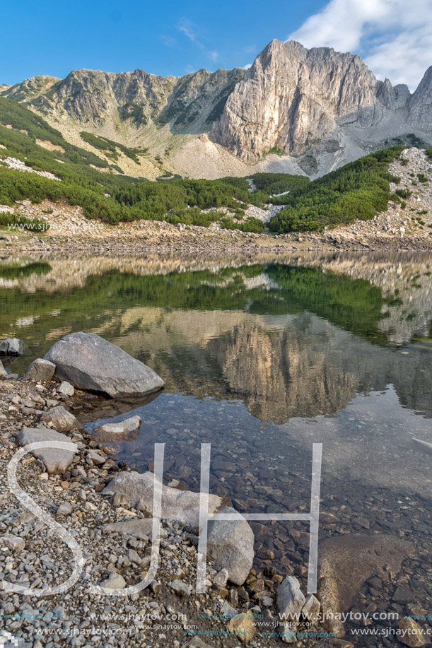 White rocks of Sinanitsa peak and  reflectionin the lake, Pirin Mountain, Bulgaria