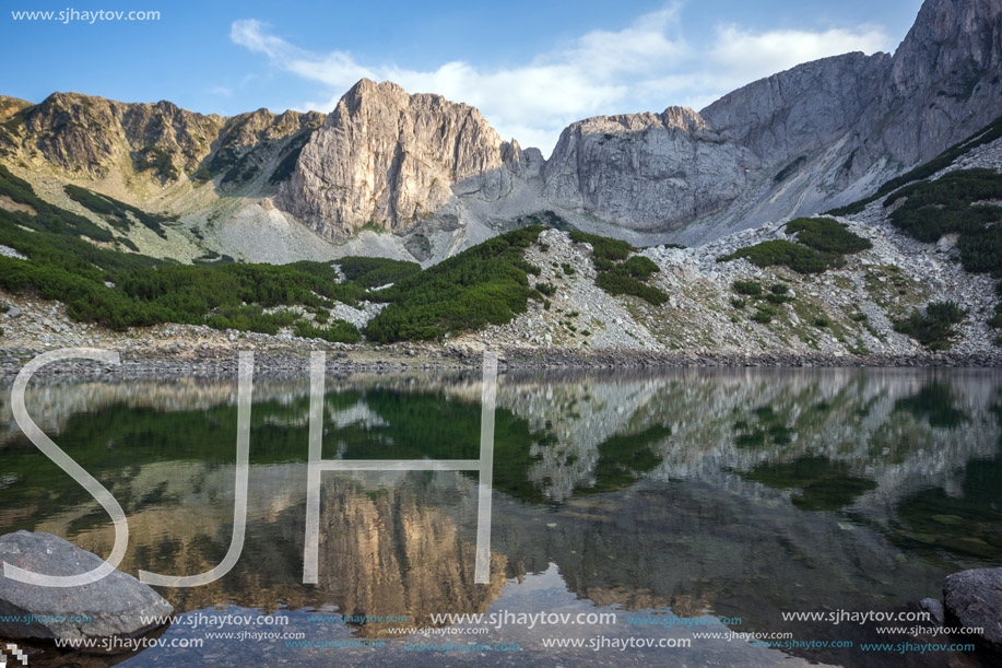 Panorama around Sinanitsa peak and  reflectionin the lake, Pirin Mountain, Bulgaria