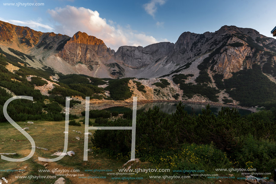 Sunset with Colored in red rock near Sinanitsa peak and  the lake, Pirin Mountain, Bulgaria