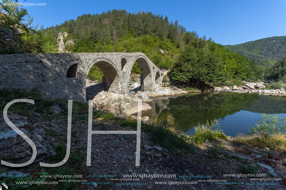 Amazing Reflection of Devil"s Bridge in Arda river and Rhodopes mountain, Kardzhali Region, Bulgaria