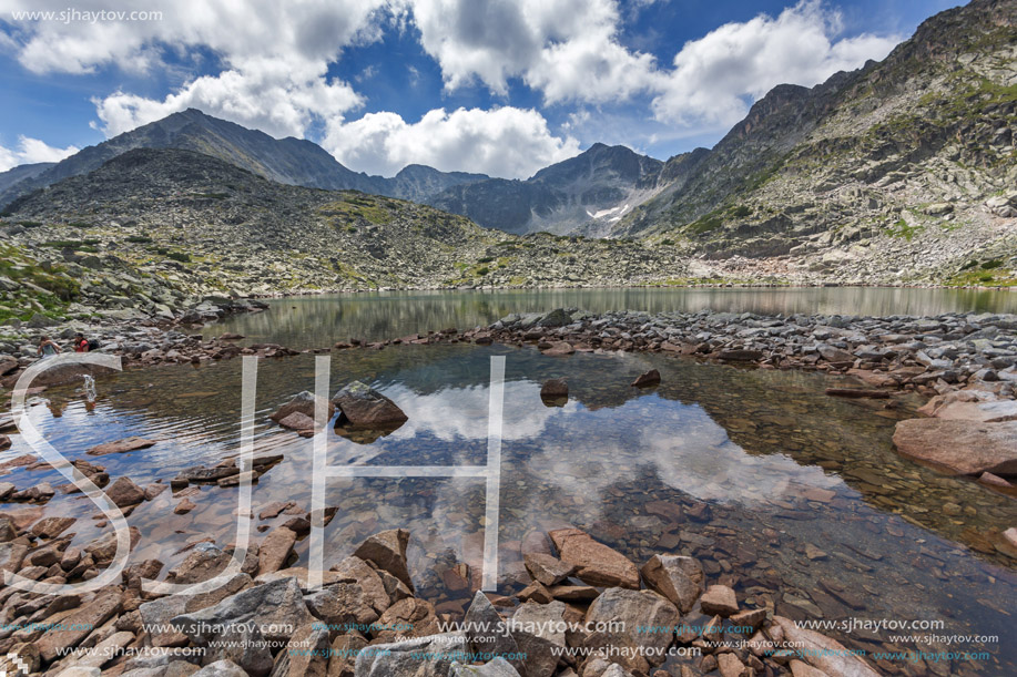 Clouds over Musala peak and reflection in Musalenski lakes,  Rila mountain, Bulgaria