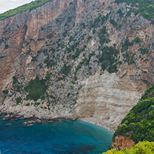 Blue water and rocks of small beach at Zakynthos island, Greece