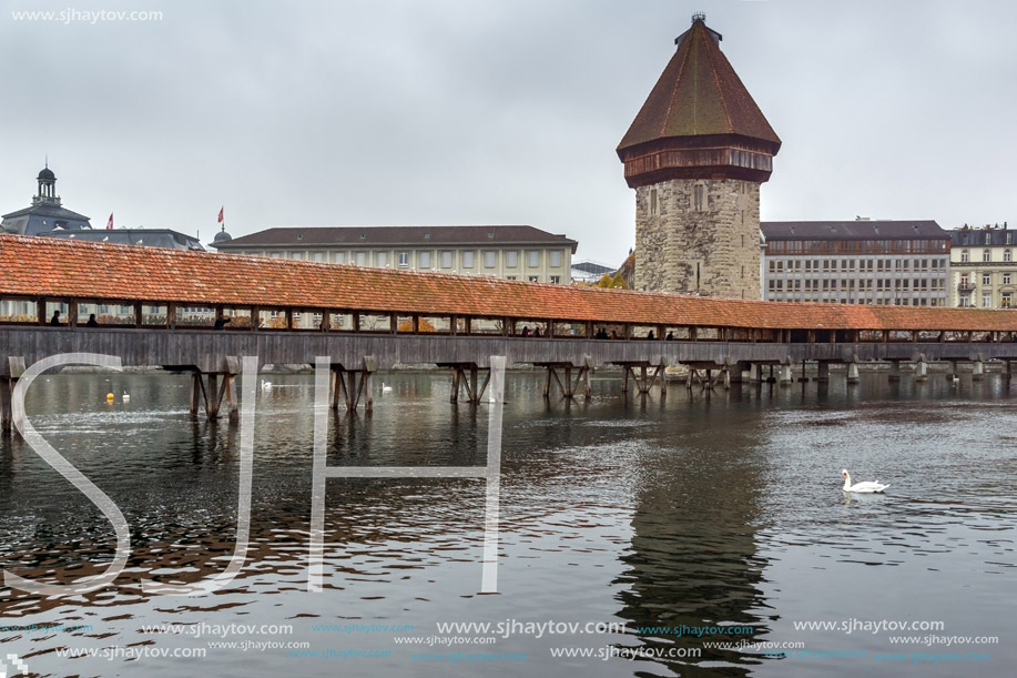 Froggy morning over Chapel Bridge and Reuss River, Lucerne, Switzerland