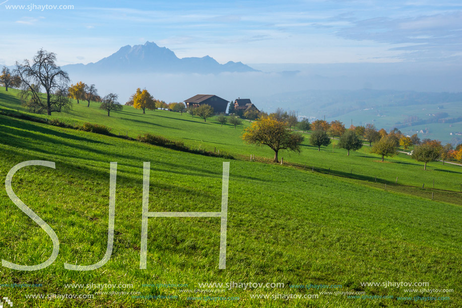 Amazing Panorama of Mount Pilatus and Lake Lucerne covered with frog, Alps, Switzerland