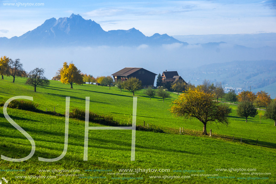 Amazing Panorama of Mount Pilatus and Lake Lucerne covered with frog, Alps, Switzerland