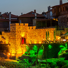 Night photo of reconstructed gate part of Sozopol ancient fortifications, Bulgaria