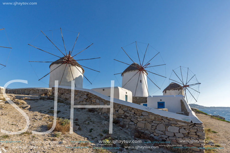 White windmill and blue sky on the island of Mykonos, Cyclades, Greece