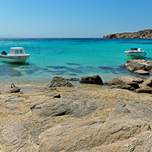 Small boat in Paranga Beach on the island of Mykonos, Cyclades, Greece