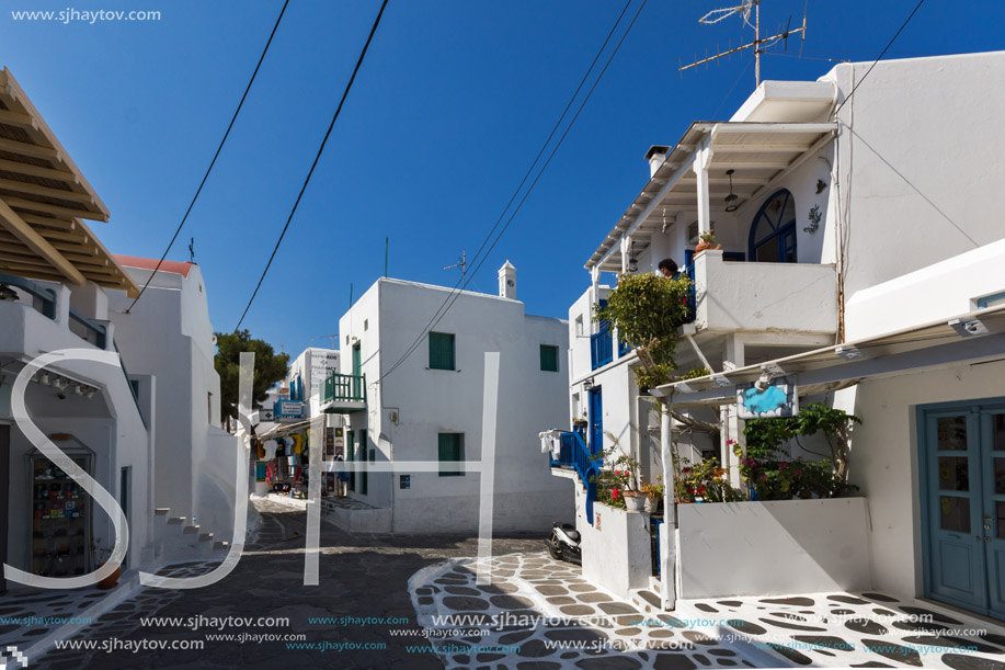 Street with white houses in town of Mykonos, Cyclades Islands, Greece