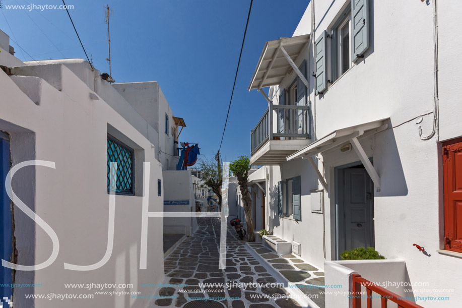 Street with white houses in town of Mykonos, Cyclades Islands, Greece