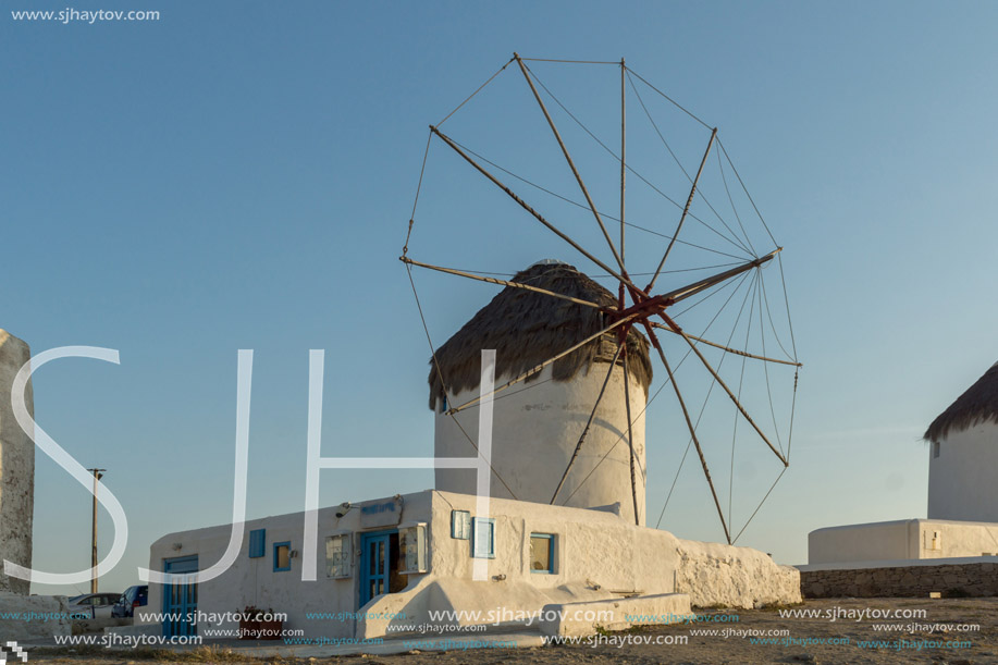 Sunset view of White windmills on the island of Mykonos, Cyclades, Greece