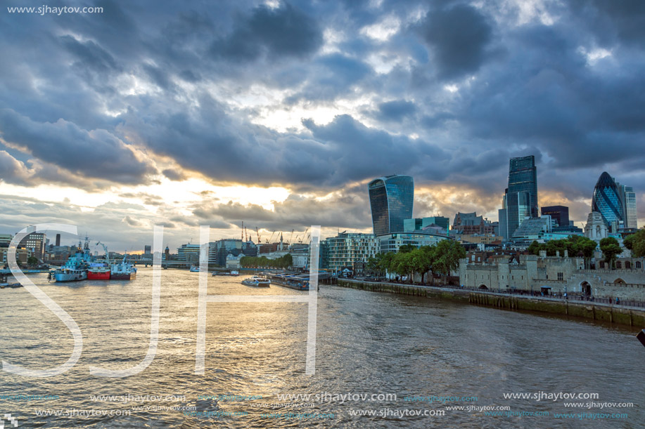Twinlight cityscape of City of London and Thames River, England, United Kingdom