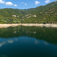 Amazing ladscape with green forest around Vacha (Antonivanovtsy) Reservoir, Rhodopes Mountain, Bulgaria