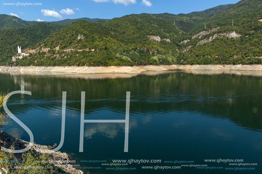 Green forest around Vacha (Antonivanovtsy) Reservoir, Rhodopes Mountain, Bulgaria