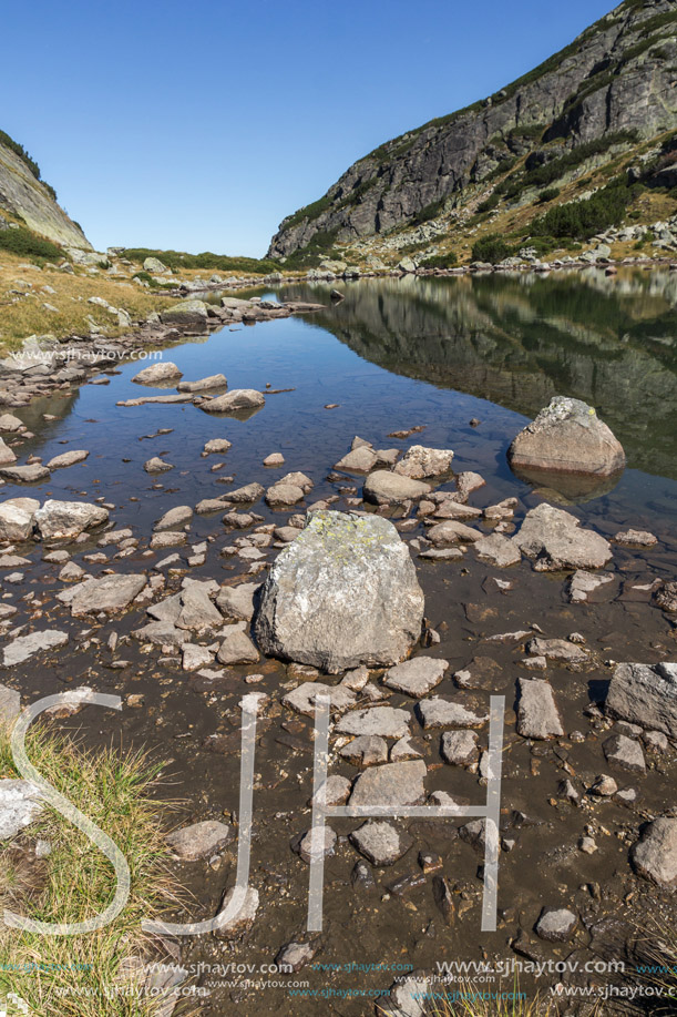 Landscape with Stones in the water in small Lake, Rila Mountain, Bulgaria