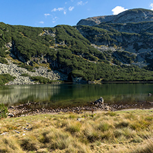 Amazing view of Yonchevo lake and green hills,  Rila Mountain, Bulgaria
