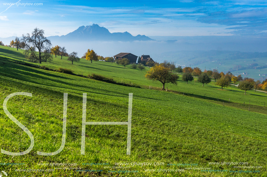 Amazing Panorama of Mount Pilatus and Lake Lucerne covered with frog, Alps, Switzerland