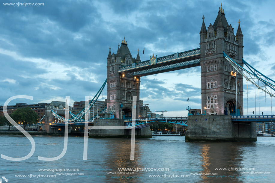 Twinlight cityscape of Tower Bridge and Thames River, England, United Kingdom