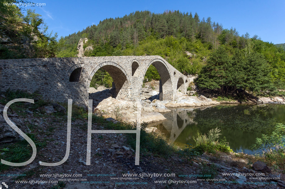 Amazing Reflection of Devil"s Bridge in Arda river, Kardzhali Region, Bulgaria