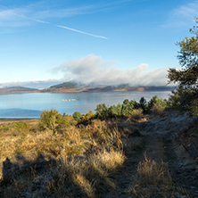 Autumn Landscape with Low clouds over water of Batak Reservoir, Pazardzhik Region, Bulgaria