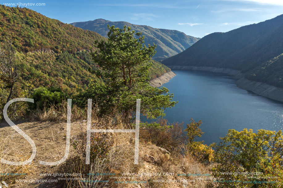 Autumn landscape of forest around Vacha (Antonivanovtsy) Reservoir, Rhodopes Mountain, Bulgaria