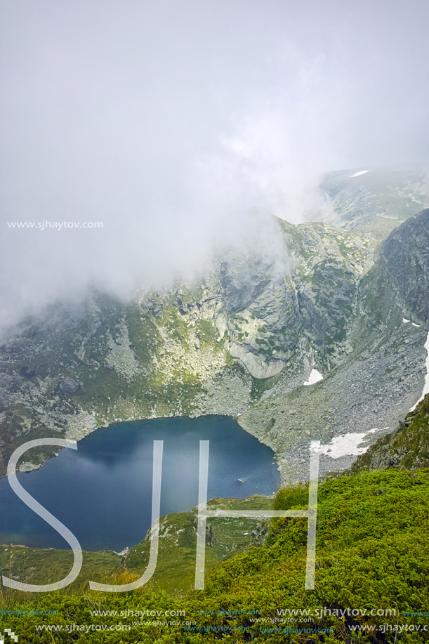 Amazing view with Fog over The Twin lake, The Seven Rila Lakes, Bulgaria