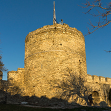 Amazing Sunset at Tower of the Byzantine fortress in Kavala, East Macedonia and Thrace, Greece