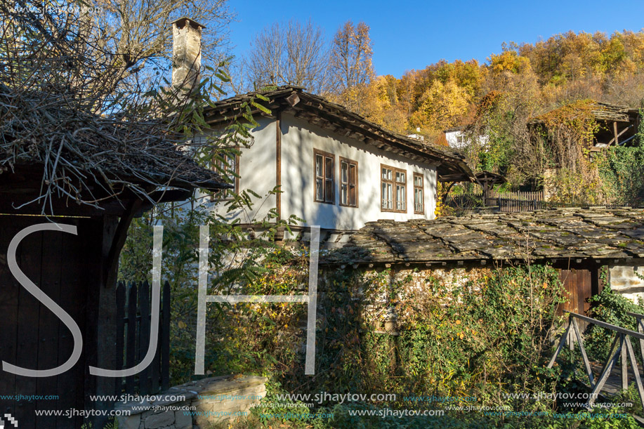 Old houses and Autumn hills in  village of Bozhentsi, Gabrovo region, Bulgaria