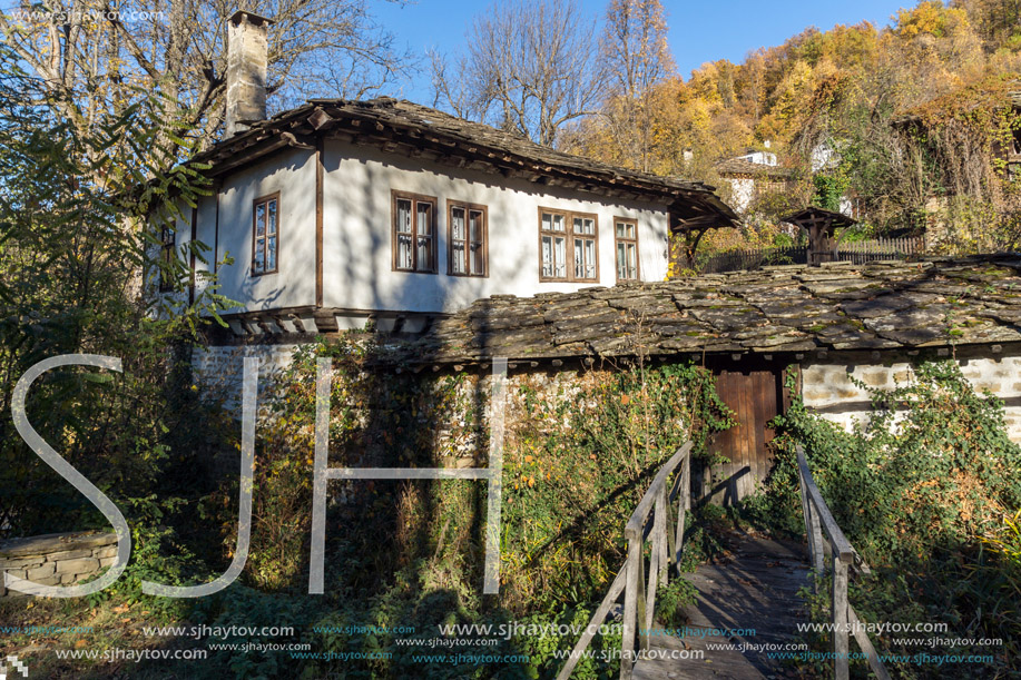 wooden Bridge and old house in village of Bozhentsi, Gabrovo region, Bulgaria