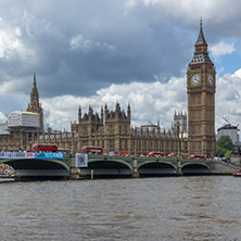 LONDON, ENGLAND - JUNE 15 2016: Red Buses on Westminster Bridge and Big Ben, London, England, United Kingdom
