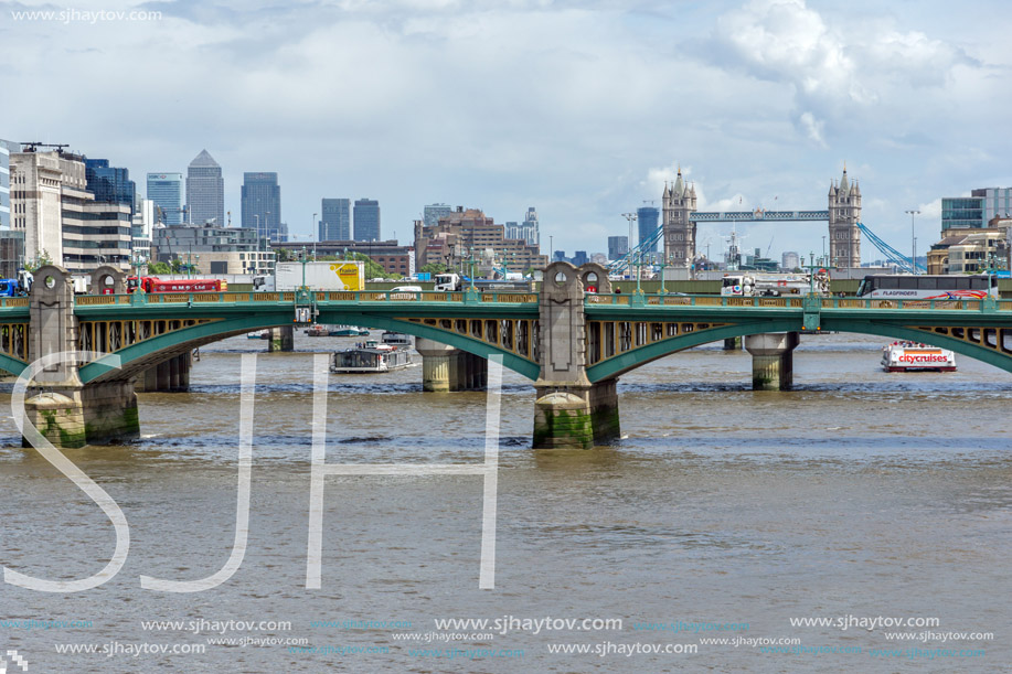 LONDON, ENGLAND - JUNE 15 2016: Southwark Bridge and Thames River, London, England, United Kingdom