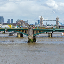 LONDON, ENGLAND - JUNE 15 2016: Southwark Bridge and Thames River, London, England, United Kingdom