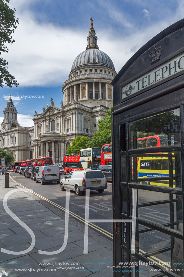 LONDON, ENGLAND - JUNE 15 2016:St. Paul Cathedral and Phone booth in London, Great Britain