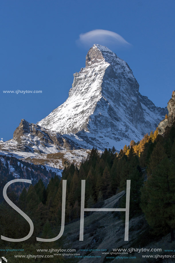 Matterhorn covered with small cloud, Canton of Valais, Alps, Switzerland